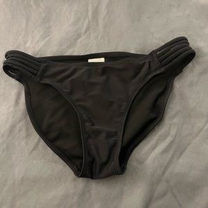 Black strappy swim suit bottoms